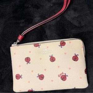 Coach ladybug print wristlet